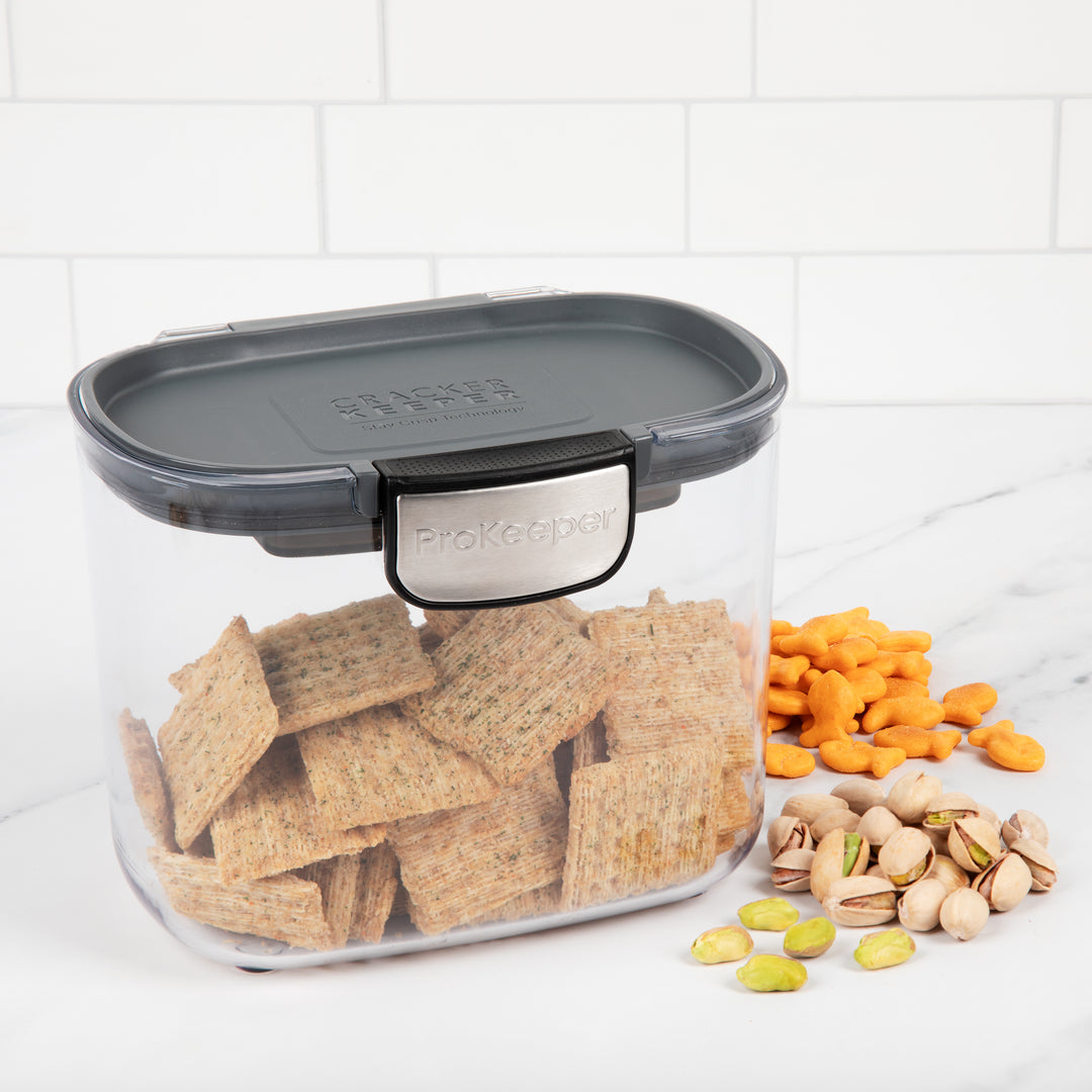 airtight food storage container with crackers, goldfish, and nuts