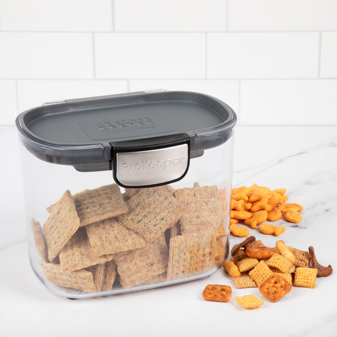 airtight cracker storage container with crackers, goldfish, and trail mix