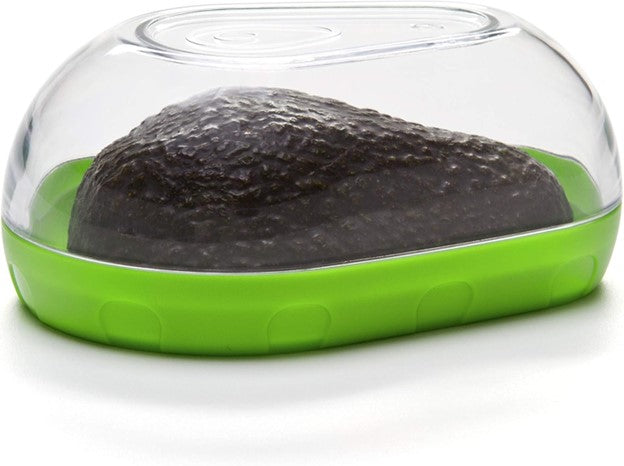 closeup of green and clear avocado keeper for food storage with half an avocado inside