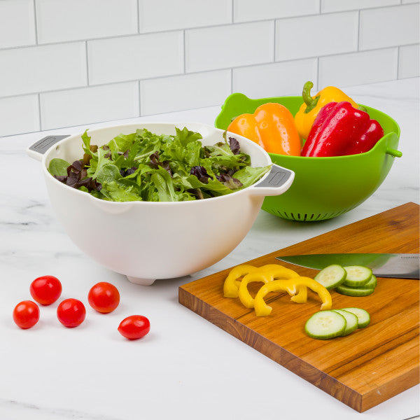 bowl and colander kitchen strainer set with salad vegetables