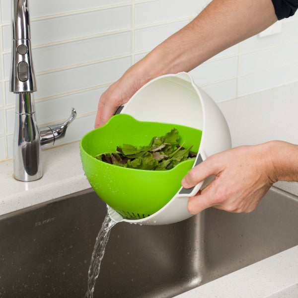 colander strainer bowl set rinsing salad greens in kitchen