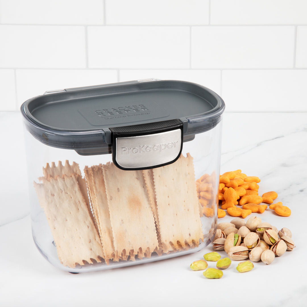 food storage container with crackers, goldfish, and nuts