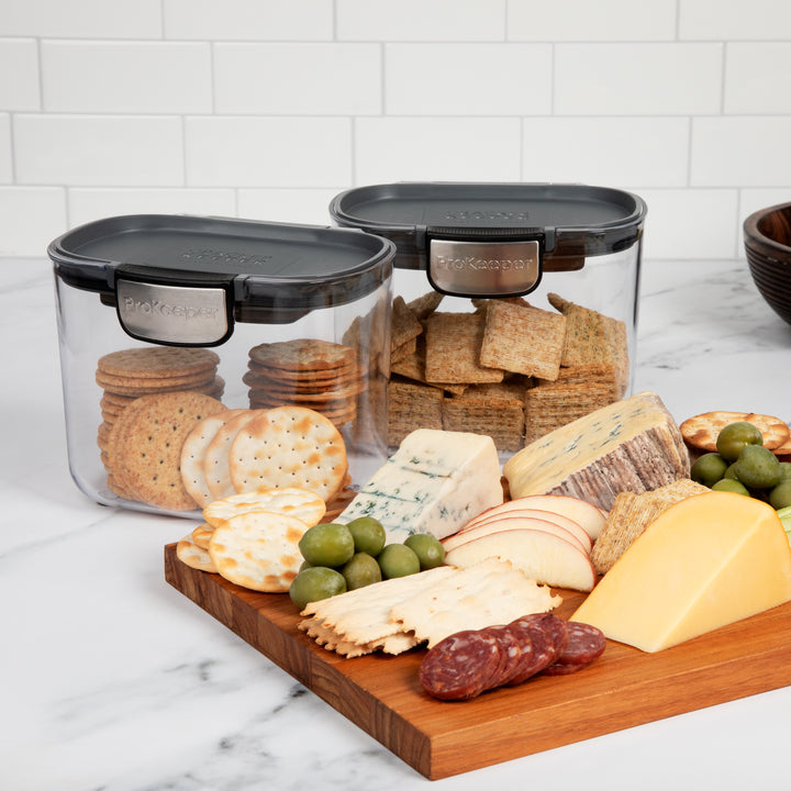 airtight food storage containers with crackers and charcuterie board