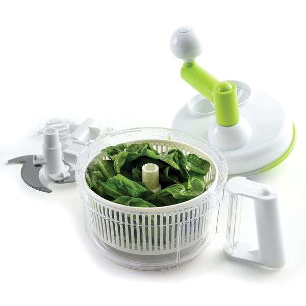 small food processor with closeup of colander strainer attachment with spinach